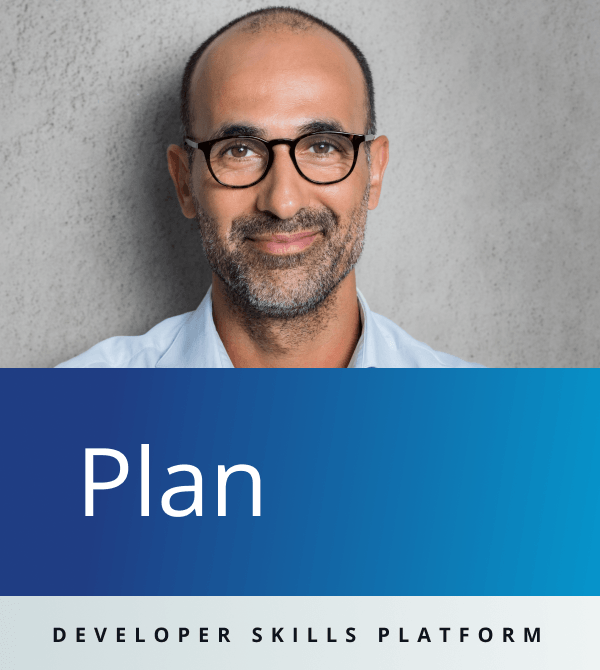 An image of a smiling man with the word "plan" written beneath