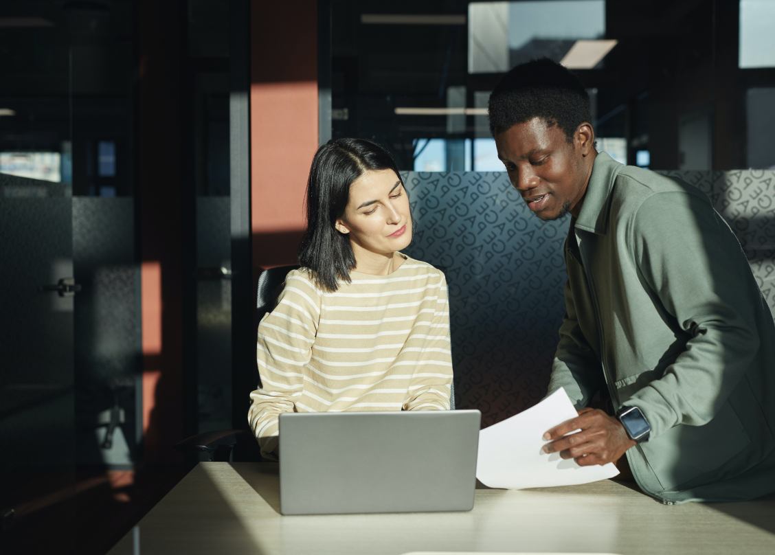 Stock photo of two coworkers representing talent acquisition teams